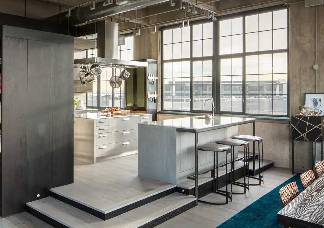 Team managing loft apartments in converted warehouse